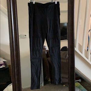 Black leggings with sheet cutouts